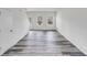 Spacious living room with neutral walls and modern flooring, filled with natural light at 613 N Pink St, Cherryville, NC 28021