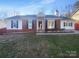 Charming single-story home with a brick facade, white siding, dark shutters, and a well-maintained front yard at 6440 Tivoli Ct, Charlotte, NC 28211