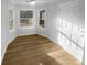 Bright sun room with new floors, fresh paint and plenty of windows letting in natural light at 6440 Tivoli Ct, Charlotte, NC 28211