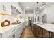 Modern kitchen with stainless steel appliances, a large island, and pendant lighting at 6727 Baker Creek Ave, Indian Land, SC 29707