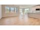 Bright and airy living space featuring hardwood floors, neutral paint, and large windows providing natural light at 8422 Norman Forest Rd, Lancaster, SC 29720