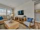 Comfortable living room features a contemporary design, a large sofa, and an entertainment center with modern decor at 8422 Norman Forest Rd, Lancaster, SC 29720