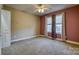 Spacious carpeted bedroom featuring a ceiling fan and natural light at 924 41St Avenue Ne Dr, Hickory, NC 28601