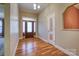 Inviting foyer boasts hardwood floors and a decorative glass front door, creating an elegant entrance to the home at 924 41St Avenue Ne Dr, Hickory, NC 28601