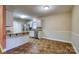 Open kitchen features granite countertops, stainless steel appliances, and ample counter space with views to a breakfast area at 924 41St Avenue Ne Dr, Hickory, NC 28601