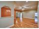 Spacious living room featuring hardwood floors, a ceiling fan, and an open-concept layout at 924 41St Avenue Ne Dr, Hickory, NC 28601
