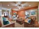 Inviting living room showcasing an open layout, hardwood floors, and modern furnishings at 924 41St Avenue Ne Dr, Hickory, NC 28601