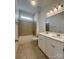 A clean bathroom showcasing the double sink vanity and shower-tub combo at 1019 Dunhill Ln, Waxhaw, NC 28173