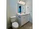 A well-lit bathroom with double sink vanity, toilet, and modern fixtures at 1019 Dunhill Ln, Waxhaw, NC 28173