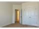 Bedroom with walk-in closet and open doorway to a bathroom at 1019 Dunhill Ln, Waxhaw, NC 28173
