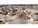 Overview of a well-planned community with diverse home styles and tree-lined streets at 113 Artisan Ct, Mooresville, NC 28117