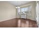 Dining room with hardwood floors, bright windows, and a stylish sideboard at 113 Artisan Ct, Mooresville, NC 28117
