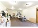 This unfinished basement is large and features a craft machine and shelving at 118 Sunset Dr, Chester, SC 29706