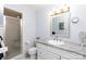 This bathroom features a granite countertop, white cabinetry, and glass door shower at 118 Sunset Dr, Chester, SC 29706
