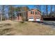 Brick house featuring a two-car garage and neatly kept lawn, blending comfort and practicality at 118 Sunset Dr, Chester, SC 29706