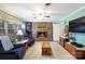 Cozy living room with brick fireplace, comfortable seating, and ample natural light for a relaxing atmosphere at 118 Sunset Dr, Chester, SC 29706