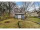 Charming backyard shed offering storage with a well-maintained lawn at 11924 Parks Farm Ln, Charlotte, NC 28277