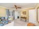 Bright secondary bedroom with carpet, ceiling fan, and a twin bed at 11924 Parks Farm Ln, Charlotte, NC 28277