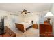 Neutral primary bedroom featuring a ceiling fan, neutral walls, and a carpeted floor at 11924 Parks Farm Ln, Charlotte, NC 28277