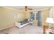 Bright secondary bedroom with carpet, ceiling fan, and a twin bed at 11924 Parks Farm Ln, Charlotte, NC 28277