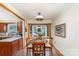 Charming breakfast nook with bay window, providing a cozy space for casual dining and natural light at 11924 Parks Farm Ln, Charlotte, NC 28277