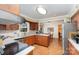 Well-appointed kitchen with stainless steel appliances, modern cabinetry, and open dining area for easy entertaining at 11924 Parks Farm Ln, Charlotte, NC 28277