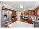 Modern kitchen with stainless steel appliances, quartz countertops, and ample cabinet space for the home chef at 11924 Parks Farm Ln, Charlotte, NC 28277
