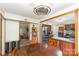 Open-concept eat-in kitchen with sleek appliances and an adjacent living area, perfect for modern living at 11924 Parks Farm Ln, Charlotte, NC 28277