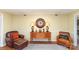 Inviting living room featuring a decorative mirror, lamps, and comfortable seating at 11924 Parks Farm Ln, Charlotte, NC 28277
