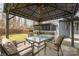 Enjoy outdoor dining on this patio with a gazebo and backyard at 11924 Parks Farm Ln, Charlotte, NC 28277
