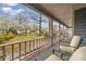 Relaxing covered porch view with comfortable seating and serene neighborhood scenery at 11924 Parks Farm Ln, Charlotte, NC 28277
