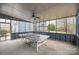 Covered patio area with a ping pong table and views of the backyard at 11924 Parks Farm Ln, Charlotte, NC 28277