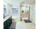 Relaxing bathroom featuring a separate shower, soaking tub, and double sink vanity at 1210 Croft Dr # 96, Fort Mill, SC 29708