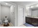 The well-lit bathroom features a toilet, vanity with granite countertops, and a linen closet at 1210 Croft Dr # 96, Fort Mill, SC 29708