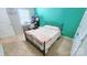 This bedroom is cozy and bright, with a bed, desk, and a convenient closet door at 1210 Croft Dr # 96, Fort Mill, SC 29708