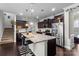 Modern kitchen with granite countertops, stainless steel appliances, and a center island with seating at 1210 Croft Dr # 96, Fort Mill, SC 29708