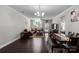 Spacious living room with dark wood floors, ample natural light, and a cozy seating area at 1210 Croft Dr # 96, Fort Mill, SC 29708