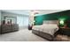 Spacious main bedroom featuring plush carpeting, a ceiling fan, and an accent wall at 1210 Croft Dr # 96, Fort Mill, SC 29708