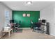 This office features two desks, comfortable chairs, an accent wall, and a window for natural light at 1210 Croft Dr # 96, Fort Mill, SC 29708