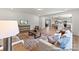 Inviting living room with an open layout, seamlessly connected to the kitchen and dining areas at 122 Tillery Ln # 759P, Mount Gilead, NC 27306