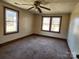 Bedroom featuring soft carpet and generous windows, creating a warm and welcoming atmosphere at 1222 Sparrow Springs Rd, Kings Mountain, NC 28086