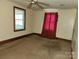 Well-lit bedroom with a large window and space for personalization at 1222 Sparrow Springs Rd, Kings Mountain, NC 28086