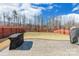 Expansive backyard featuring a concrete patio, a grill, well maintained lawn, and a privacy fence at 147 Colonial Reserve Ave, Troutman, NC 28166