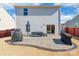 Spacious backyard featuring a concrete patio, grill, and a fence; perfect for outdoor gatherings at 147 Colonial Reserve Ave, Troutman, NC 28166