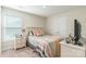 Comfortable bedroom featuring a full-size bed, nightstand, soft carpet, and a closet at 147 Colonial Reserve Ave, Troutman, NC 28166