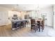 Bright and airy kitchen featuring a large island, modern appliances, and a dining area at 147 Colonial Reserve Ave, Troutman, NC 28166