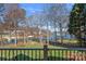 Scenic backyard view featuring lush greenery and lake access at 15015 Nc Hwy 73 Hwy, Huntersville, NC 28078