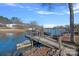 Private boat dock with boat lift and seating for enjoying the lake at 15015 Nc Hwy 73 Hwy, Huntersville, NC 28078
