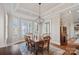 Elegant dining room with coffered ceiling and scenic lake views at 15015 Nc Hwy 73 Hwy, Huntersville, NC 28078