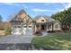 Beautifully crafted home with a spacious two-car garage and well-manicured front lawn at 15015 Nc Hwy 73 Hwy, Huntersville, NC 28078